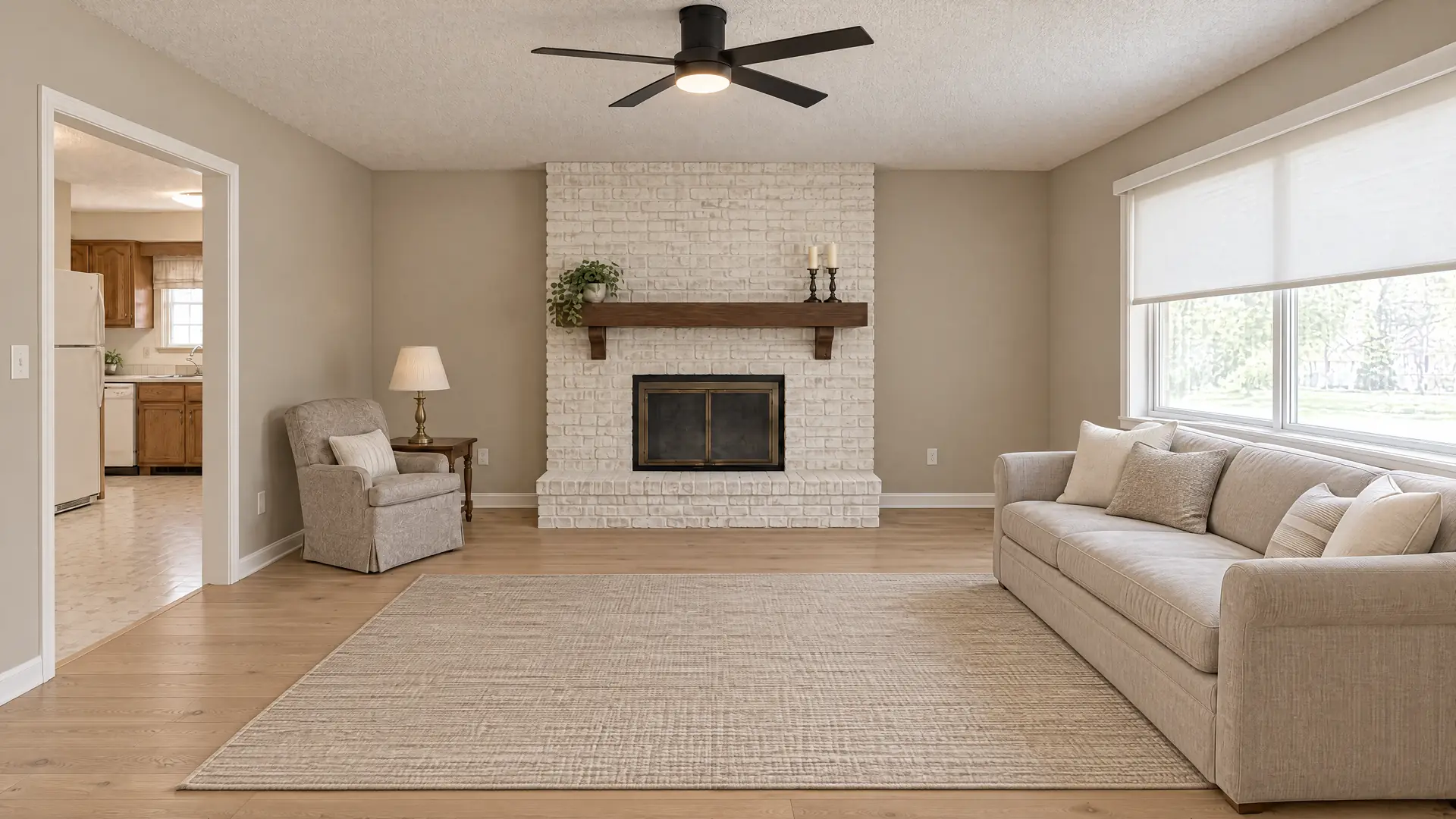 Illustration of the same living room after a refresh, with the brick painted white, a new ceiling fan and new floors