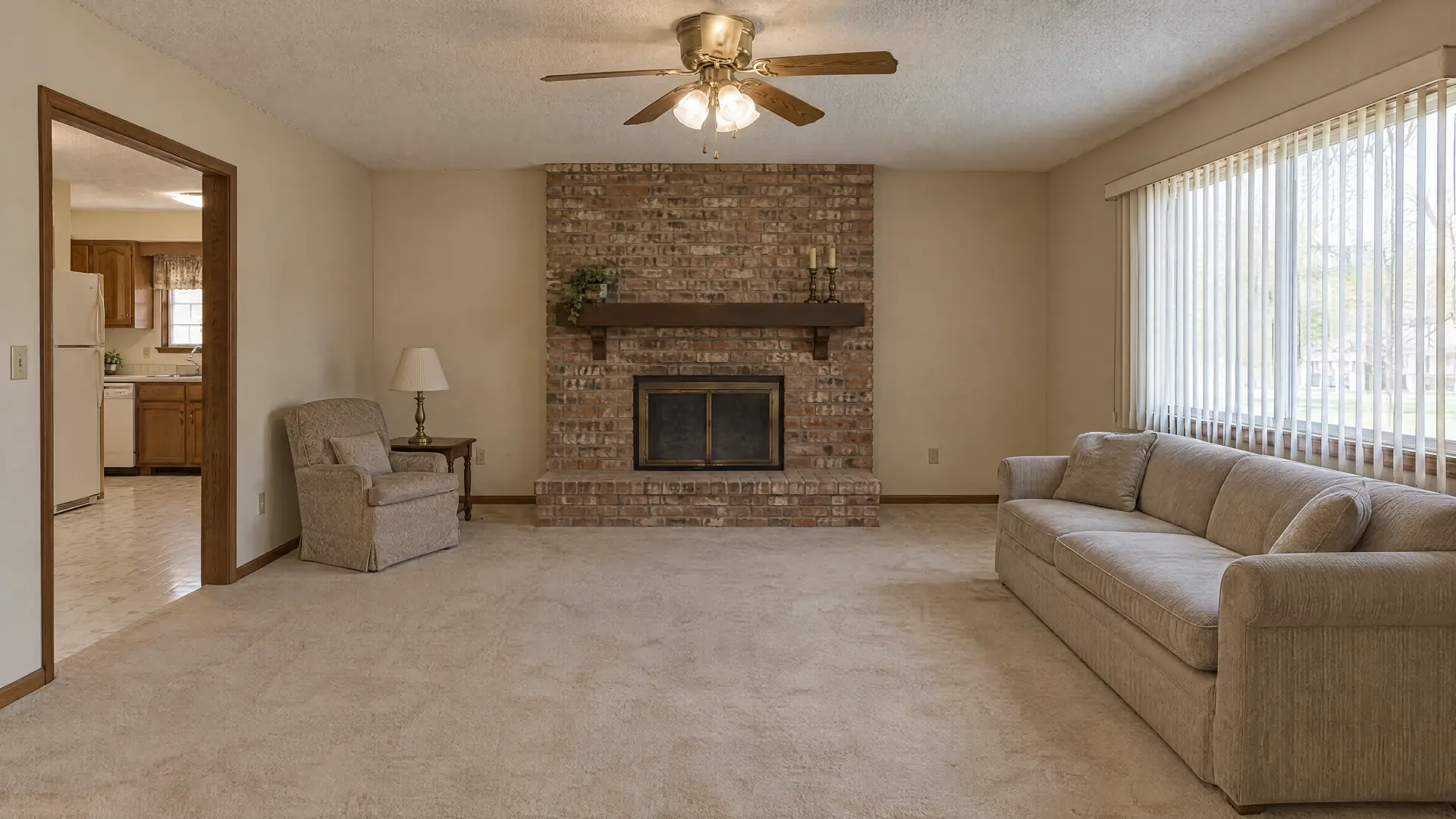 Illustration of a dated living room before remodeling, with a brick fireplace, carpet and a ceiling fan
